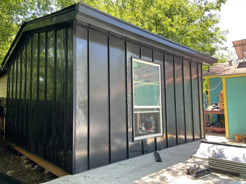 Black standing seam metal wall panels for Roof Inspection in Green River