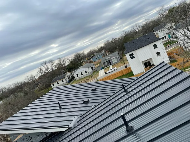 Standing seam metal roof panels with vents for Skylight Repair in Green River
